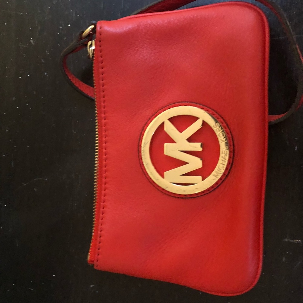 Michael Kors orange clutch